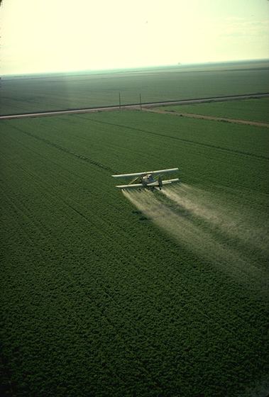 Aerial spray pass over a field